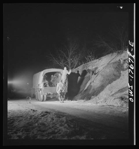 Untitled photo, possibly related to: Carlisle, Pennsylvania. U.S. Army medical field service school. Truck in distance is carrying doctors in training to unknown spots. They are given a certain length of time to find their way to a given location
