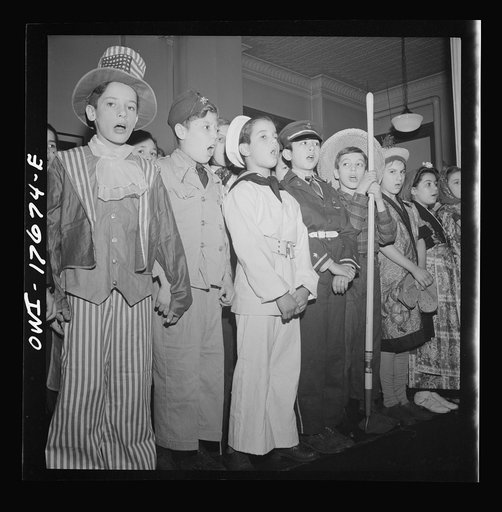 New York, New York finale in a play on America at war, given by students of public school eight in an Italian-American district. Left to right: Uncle Sam, soldier, sailor, Chinese soldier, farmer, housewife