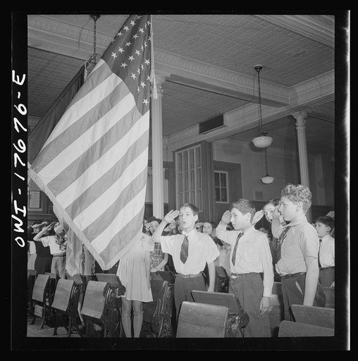 New York, New York students pledging allegiance to the flag in public school eight in an Italian-American section