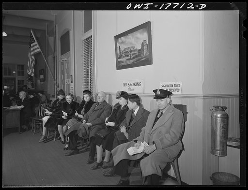 Washington, D.C. Waiting in line at lunch hour to register for the second ration book at a public school on the corner of Tenth and F Streets