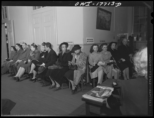 Washington, D.C. Waiting in line at lunch hour to register for the second ration book at a public school on the corner of Tenth and F Streets