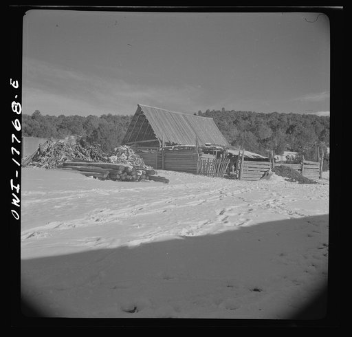 Trampas, Taos County, New Mexico. A Spanish-American village in the foothills of the Sangre de Cristo Mountains. Each house has its corral built of aspen and pine cut from the mountains above the village