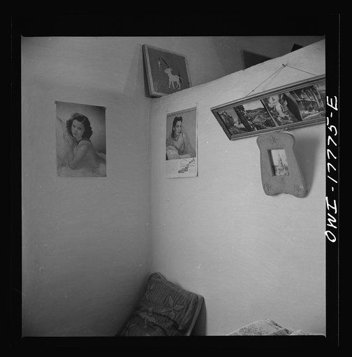 Trampas, New Mexico. Spanish-Americans like any kind of pictures; even Hollywood beauties have their place with the saints on the family wall. These pictures are in the home of Juan Lopez, the majordomo (mayor) [i.e., steward