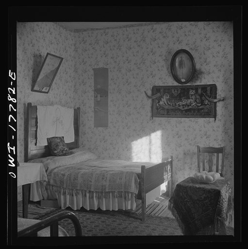 Trampas, New Mexico. Bedroom in the house of Juan Lopez, the majordomo (mayor) [i.e., steward
