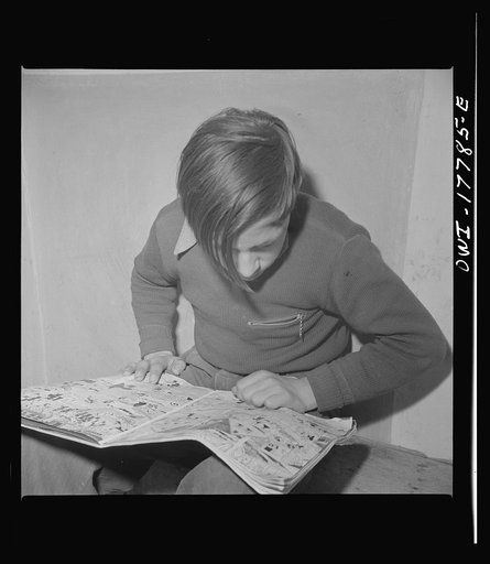 Trampas, New Mexico. Even in this remote Spanish American village, children, like the son of Juan Lopez, the majordomo (mayor) [i.e., steward], read the "funnies"