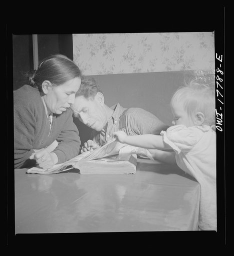 Untitled photo, possibly related to: Trampas, New Mexico. Everybody in remote New Mexico buys by mail. Juan Lopez, the majordomo (mayor) [i.e., steward], and his wife Maclovia are thinking of buying new harnesses; it will cost sixty dollars, so they will probably get along with what they have
