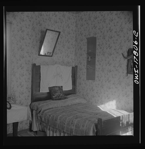 Untitled photo, possibly related to: Trampas, New Mexico. Bedroom in the house of Juan Lopez, the majordomo (mayor) [i.e., steward