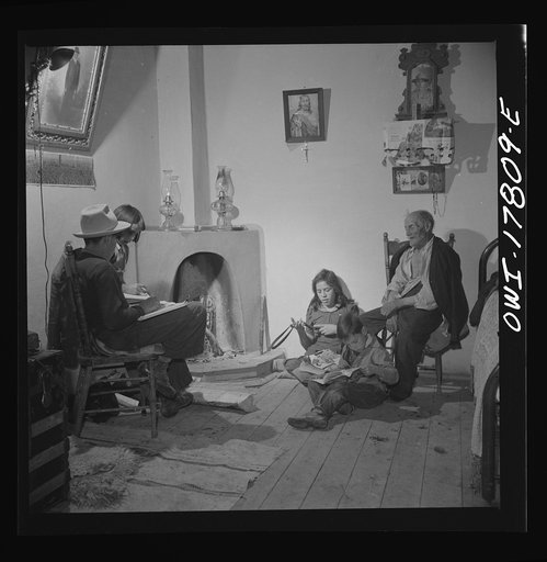 Trampas, New Mexico. The Lopez children often call on their grandfather in the evenings to hear tales of the old days when Trampas was a thriving sheep town