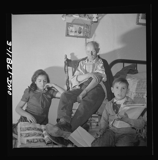 Untitled photo, possibly related to: Trampas, New Mexico. Grandfather Romero, a member of the family of Juan Lopez, the majordomo (mayor) [i.e., steward], is ninety-nine years old. He has seen the old world change to the new