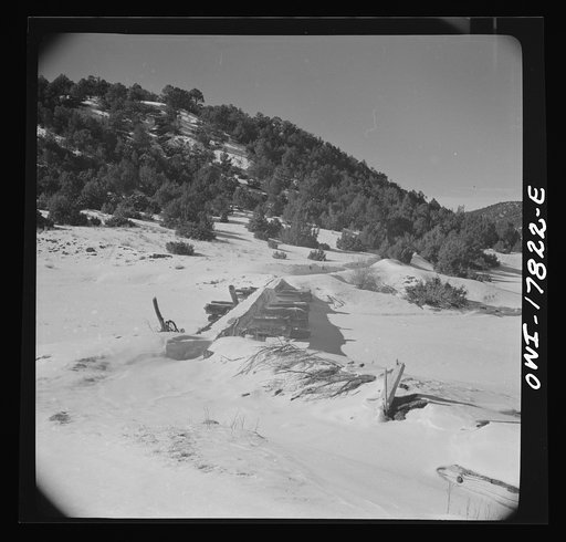 Trampas, Taos County, New Mexico. A Spanish-American village in the foothills of the Sangre de Cristo Mountains. Ditches and hand-hewn flumes carry the mountain water out over the valley for irrigation