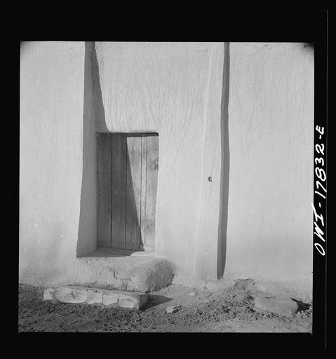 Trampas, Taos County, New Mexico. American village in the foothills of the Sangre de Cristo Mountains. Adobe construction is practical if it is kept up by replastering at least every two years
