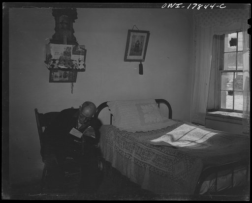 Untitled photo, possibly related to: Taos County, New Mexico. Father Cassidy, the Catholic priest of the parish of Penasco, advising his parishioners