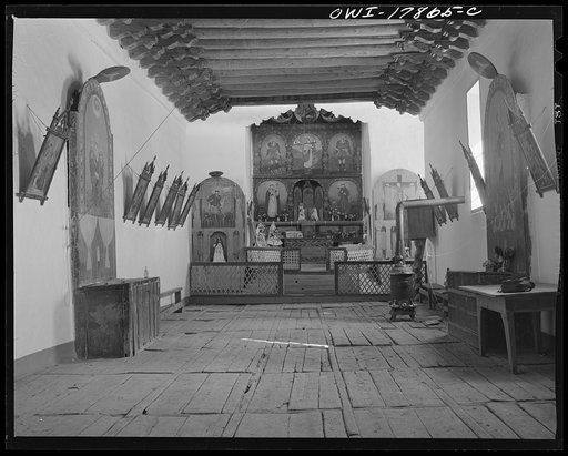 Trampas, New Mexico. Graves are beneath the entire surface of the floor of this church, built in 1700, and the best-preserved colonial mission in the Southwest
