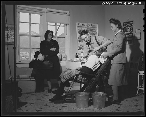 Untitled photo, possibly related to: Questa, New Mexico. Dentist making an extraction in the clinic operated by the Taos County cooperative health association