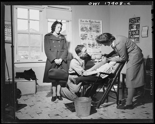 Questa, New Mexico. Among patients at the clinic operated by the Taos County cooperative health association there is as much dental trouble with children as with adults, due to lack of vitamins and calcium in the native diet