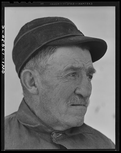 Untitled photo, possibly related to: Taos County, New Mexico. Father Cassidy, the Catholic priest of the parish of Penasco with his father who is a rancher in Mora County