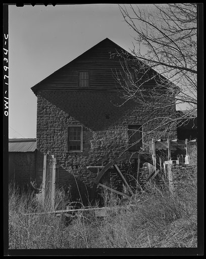 Untitled photo, possibly related to: Mora (vicinity), New Mexico. A flour mill driven by water and steam