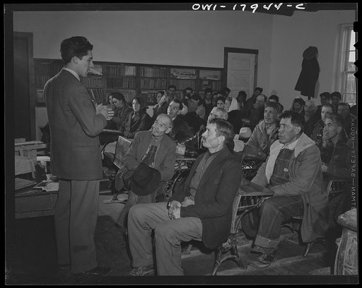 Chamisal, New Mexico. United States Agricultural Adjustment Administration representative explaining a farm plan to Spanish-American ranchers