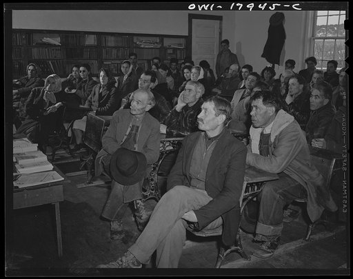 Untitled photo, possibly related to: Chamisal, New Mexico. United States Agricultural Adjustment Administration representative explaining a farm plan to Spanish-American ranchers