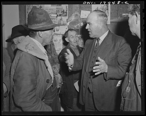 Chamisal, New Mexico. United States Agricultural Adjustment Administration representative explaining a farm plan to Spanish-American ranchers