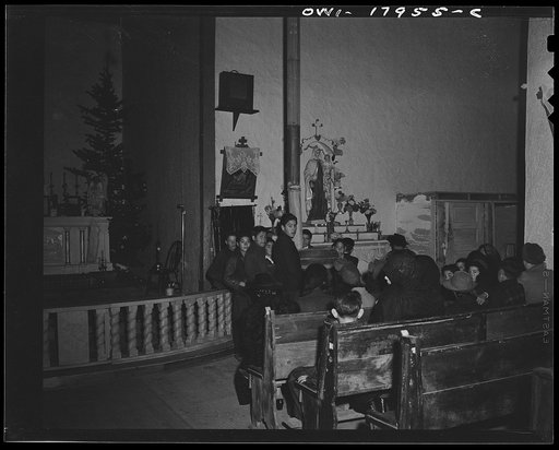 Untitled photo, possibly related to: Questa, New Mexico. Father Smith preaching in Spanish over the loudspeaker in the church