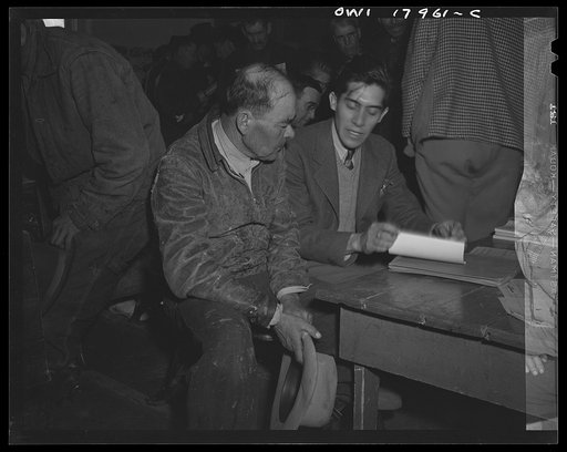 Untitled photo, possibly related to: Chamisal, New Mexico. United States Agricultural Adjustment Administration representative explaining a farm plan to Spanish-American ranchers