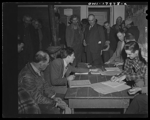 Untitled photo, possibly related to: Chamisal, New Mexico. United States Agricultural Adjustment Administration representative explaining a farm plan to Spanish-American ranchers