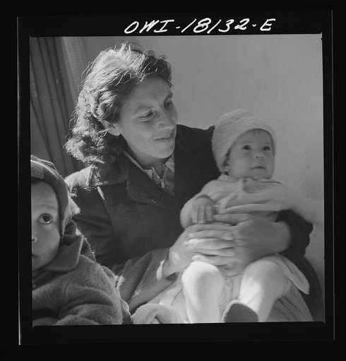 Untitled photo, possibly related to: Questa, New Mexico. Mother and child, patients at the clinic operated by the Taos County cooperative health association