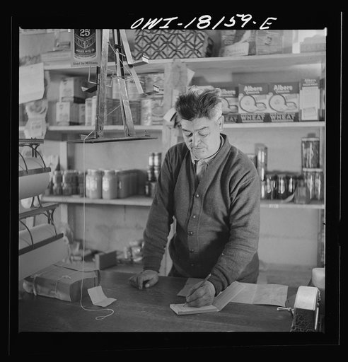 Questa, Taos County, New Mexico. The keeper of the general store