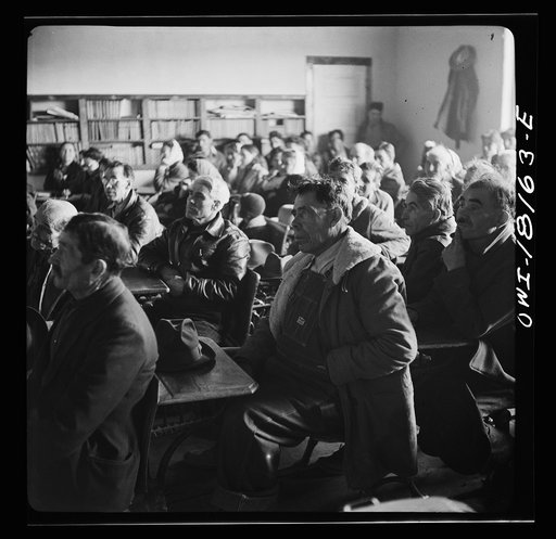 Untitled photo, possibly related to: Chamisal, New Mexico. United States Agricultural Adjustment Administration representative explaining a farm plan to Spanish-American ranchers