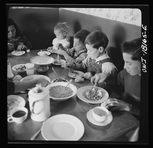 Untitled photo, possibly related to: Trampas, New Mexico. Noon day meal at the home of Juan Lopez, majordomo (mayor) [i.e., steward