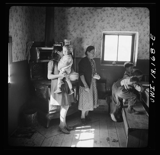 Trampas, New Mexico. The family of Juan Lopez at dinner
