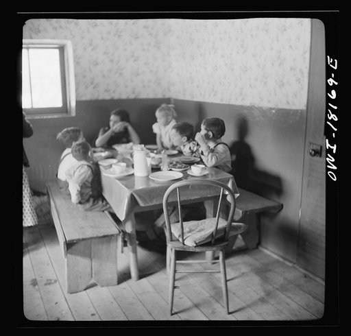 Trampas, New Mexico. The family of Juan Lopez at dinner