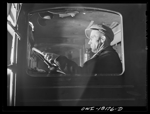 New York, New York. Associated Transport Company. Driver at the wheel of a truck which he is going to take to Baltimore
