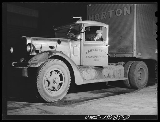 New York, New York. Associated Transport Company trucking terminal on Washington Street. Main line driver backing a truck which he is about to take to Baltimore