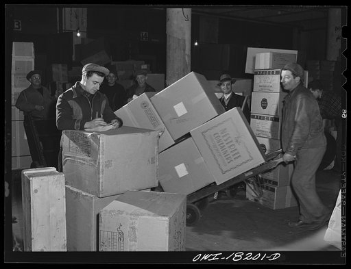 New York, New York. Associated Transport Company. The checker notes every load of goods that goes on each truck