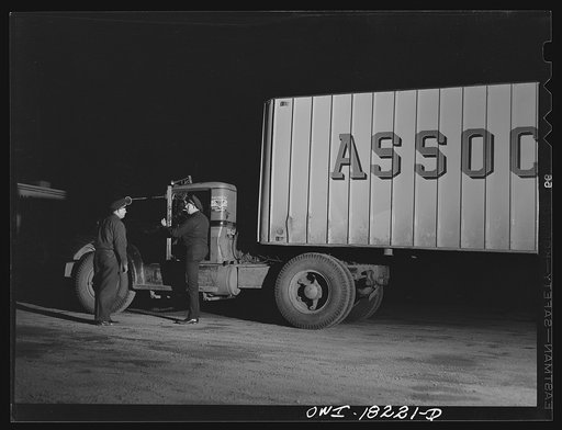 New Castle (vicinity), Delaware. Truck drivers talking at the place where they have stopped for dinner along U.S. Highway 40