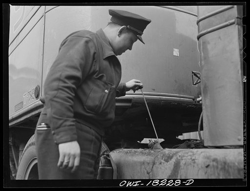 Untitled photo, possibly related to: New York, New York. Associated Transport Company trucking terminal on Washington Street. Driver Hunter V. Rhyne getting into the truck which he will drive to Baltimore