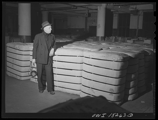 New York, New York. Associated Transport Company trucking terminal on Twenty-third street. Night watchman. This floor is for goods in storage