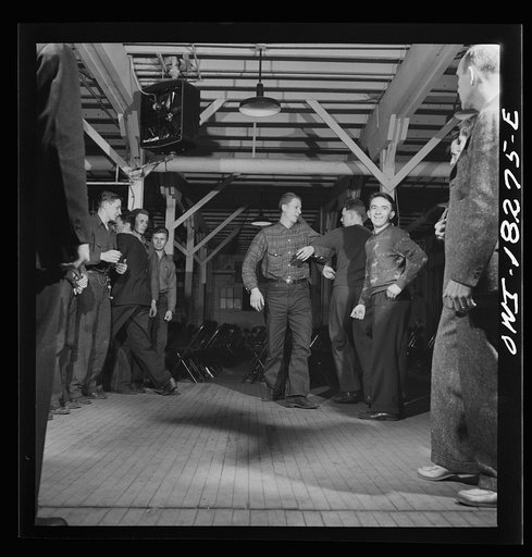Madison, Wisconsin. Farm short course school at the University of Wisconsin. Interest in rural culture and customs is stimulated at the school. This class in rural society often practices square dances