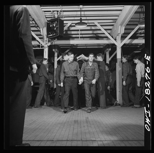 Untitled photo, possibly related to: Madison, Wisconsin. Farm short course school at the University of Wisconsin. Interest in rural culture and customs is stimulated at the school. This class in rural society often practices square dances
