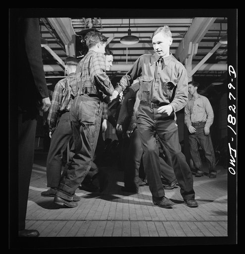 Madison, Wisconsin. Farm short course school at the University of Wisconsin. Interest in rural culture and customs is stimulated at the school. This class in rural society often practices square dances