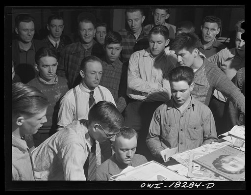 Untitled photo, possibly related to: Madison, Wisconsin. Farm short course school at the University of Wisconsin. Before going to dinner the boys gather around the piano to sing songs