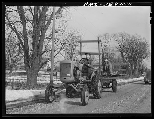 Verona, Wisconsin. Loren Mead learning to drive a tractor on the farm of Mr. Arthur Fleming, where he was placed after finishing the farm short course at the University of Wisconsin