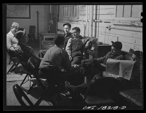 Madison, Wisconsin. Farm short course school at the University of Wisconsin. Students spend most of their evenings lounging around and listening to the radio after their homework is completed