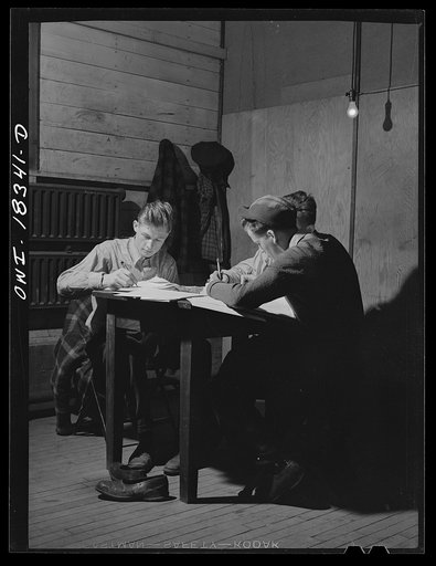 Madison, Wisconsin. Farm short course school at the University of Wisconsin. Students doing their homework in the dormitory