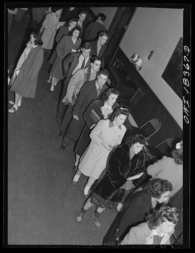 Madison, Wisconsin. Farm short course school at the University of Wisconsin. Students waiting in line to register for ration book number two