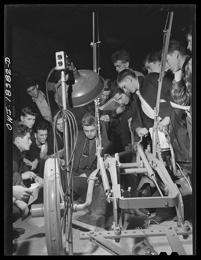 Madison, Wisconsin. Farm short course school at the University of Wisconsin. Students in the farm machinery class studying a plow. Their instructor is Professor T. Thorsen