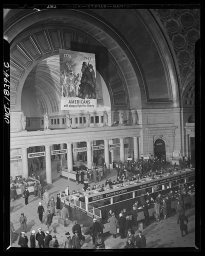 Untitled photo, possibly related to: Washington, D.C. Interior view of the Union Station with Office of War Information (OWI) poster in the background