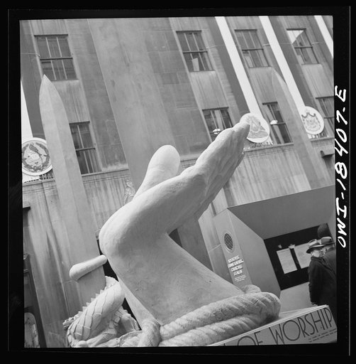 Untitled photo, possibly related to: New York, New York. "United Nations" exhibition of photographs presented by the United States Office of War Information (OWI) on Rockefeller Plaza. Listening to broadcasts of President Roosevelt, Churchill, Stalin, and Chiang Kai-Chek, heard every half-hour from 